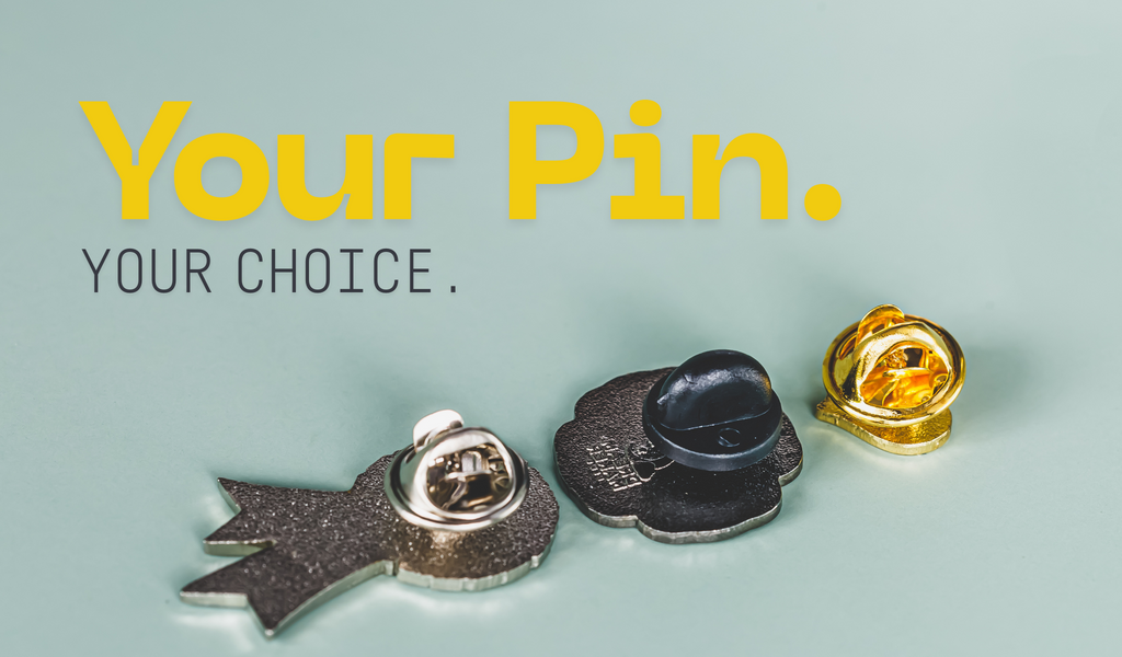 Enamel pins with rubber, silver butterfly, and gold butterfly backs under text “Your Pin. Your Choice.”