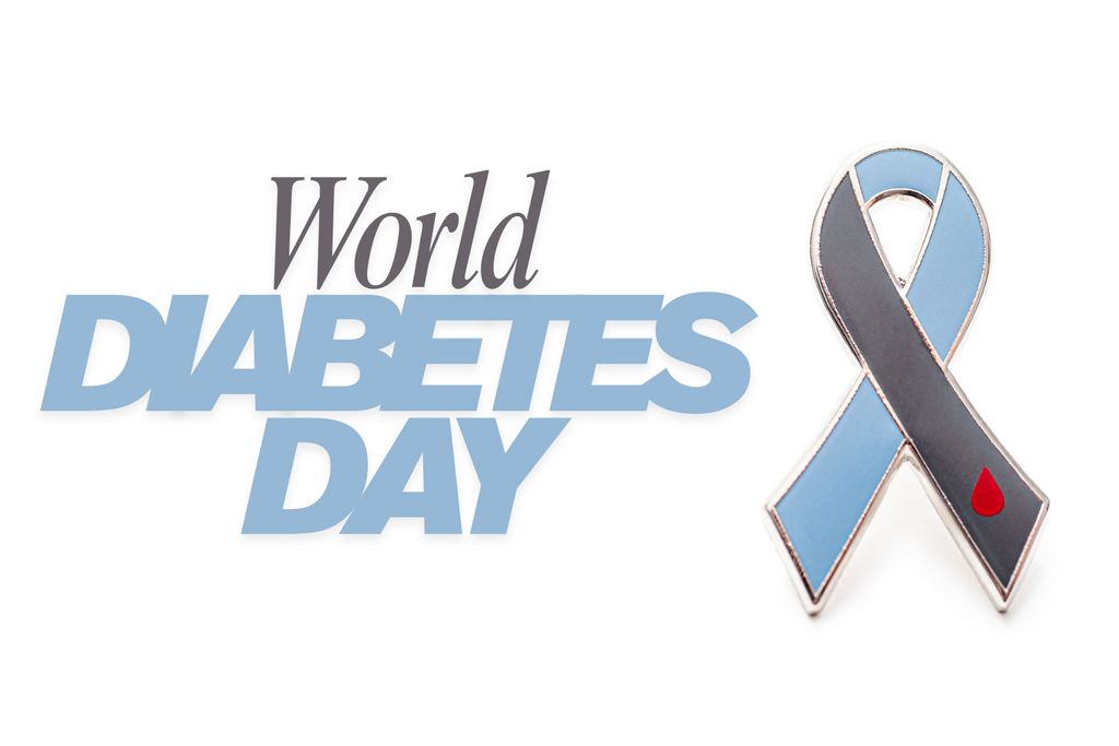 The words world diabetes Day with Dream maker pins' diabetes awareness ribbon pin on white