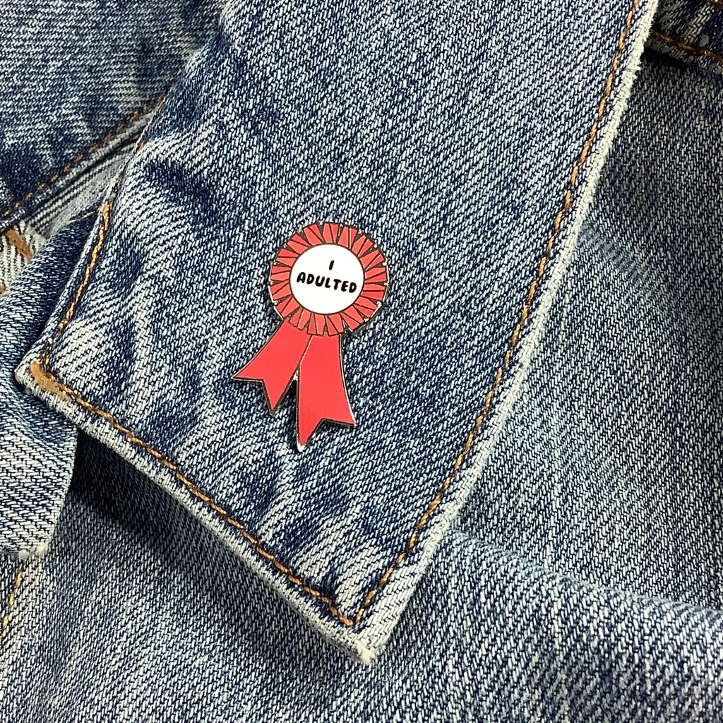 Red I ADULTED award ribbon enamel pin - Dream Maker Pins
