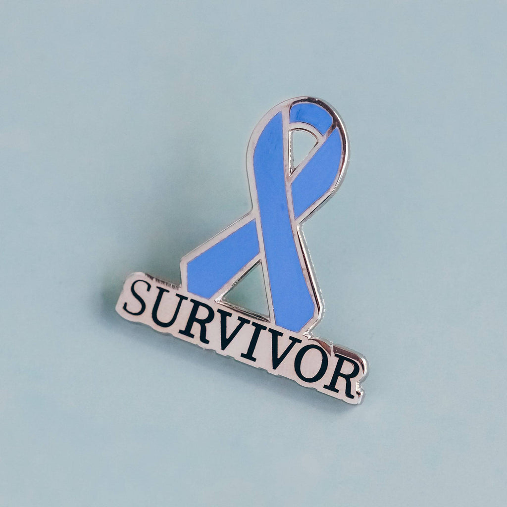 Periwinkle Survivor Awareness Ribbon Enamel Pin with SURVIVOR text for stomach cancer, esophageal cancer, eating disorders, and digestive health awareness.